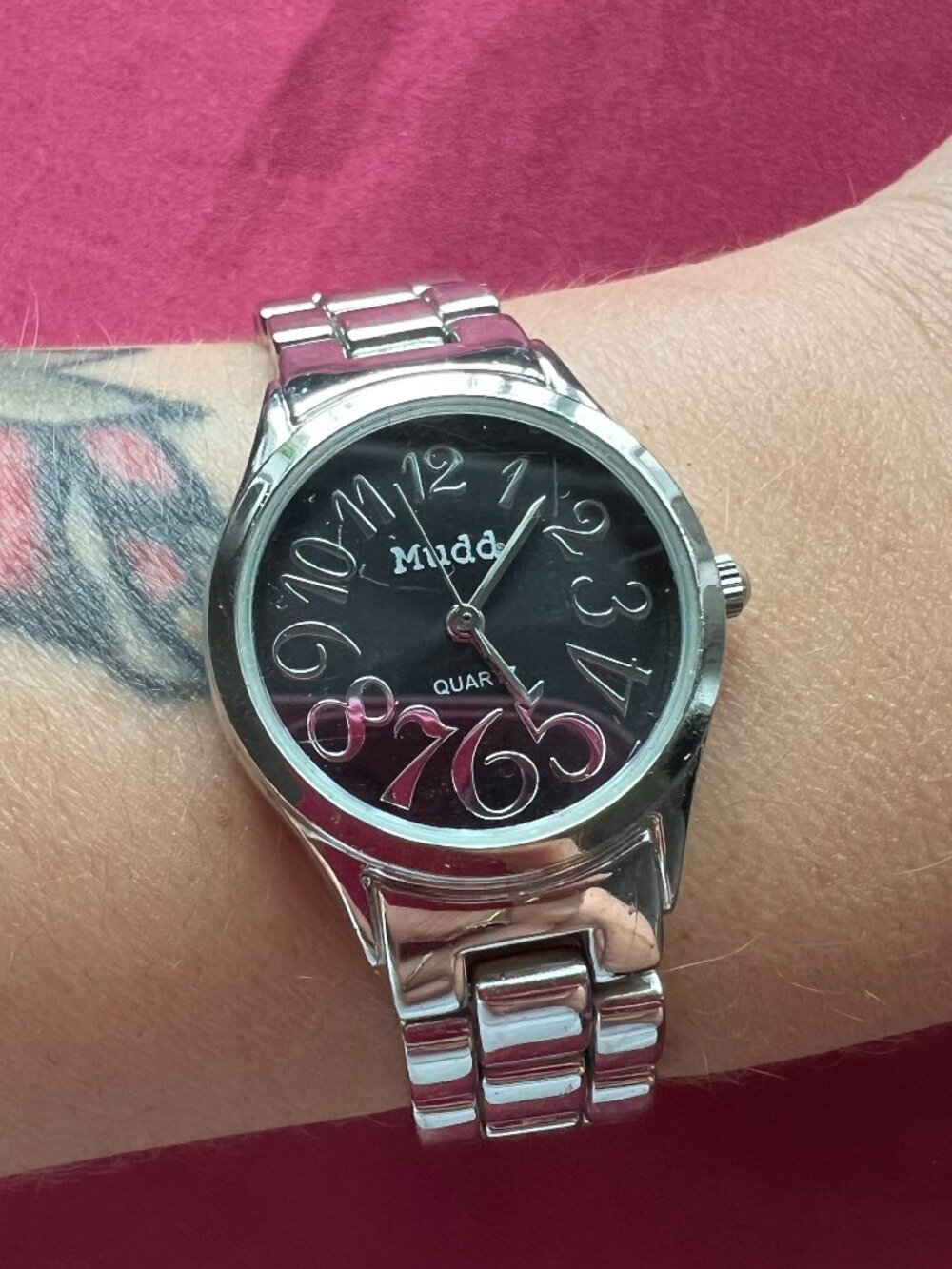 Mudd Women's Quartz Analog Watch Black Dial Arabic Numerals Silver Bracelet